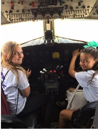 Students at VNY in cockpit of jet