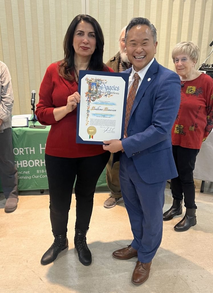 Madlena receiving certificate