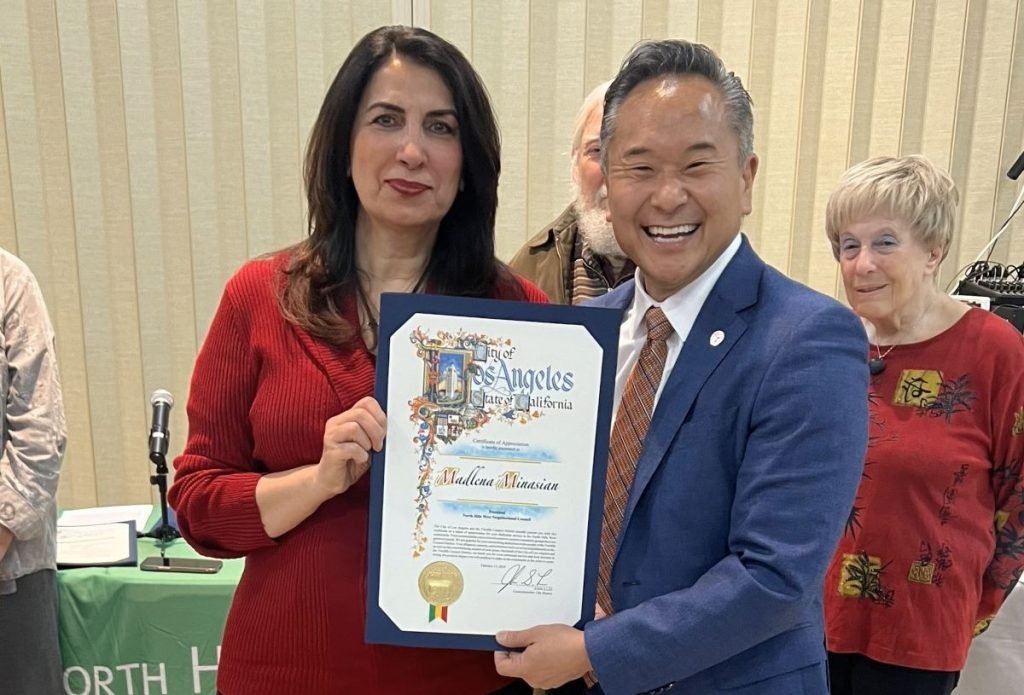 Madlena receiving certificate