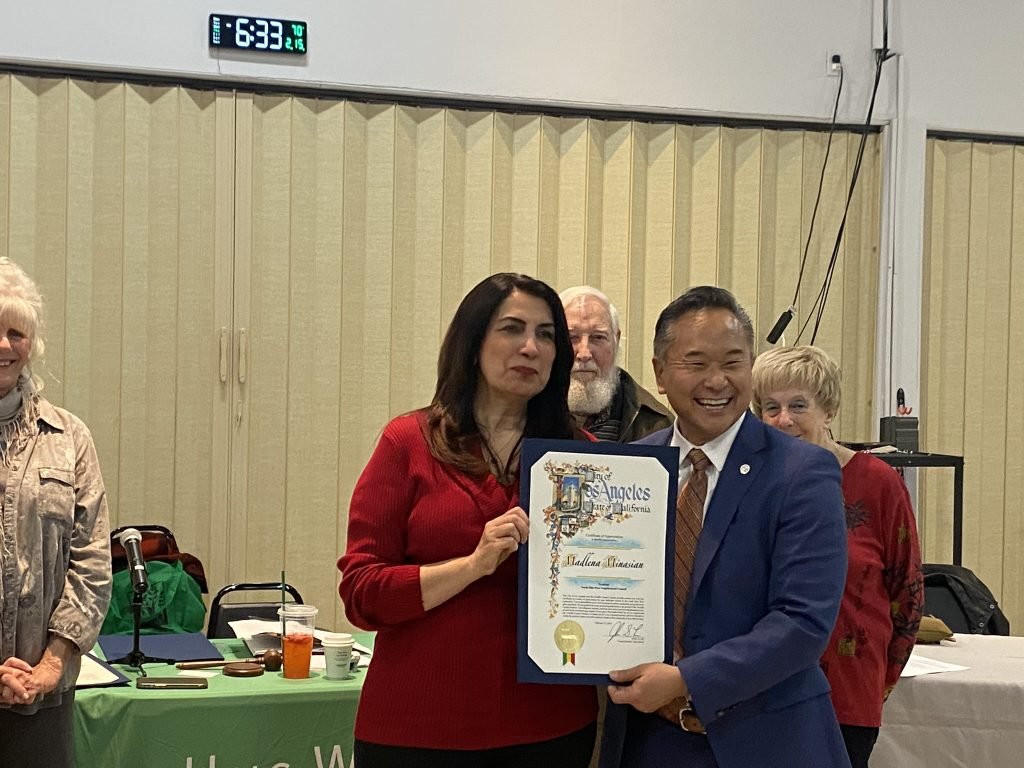 Madlena receiving certificate